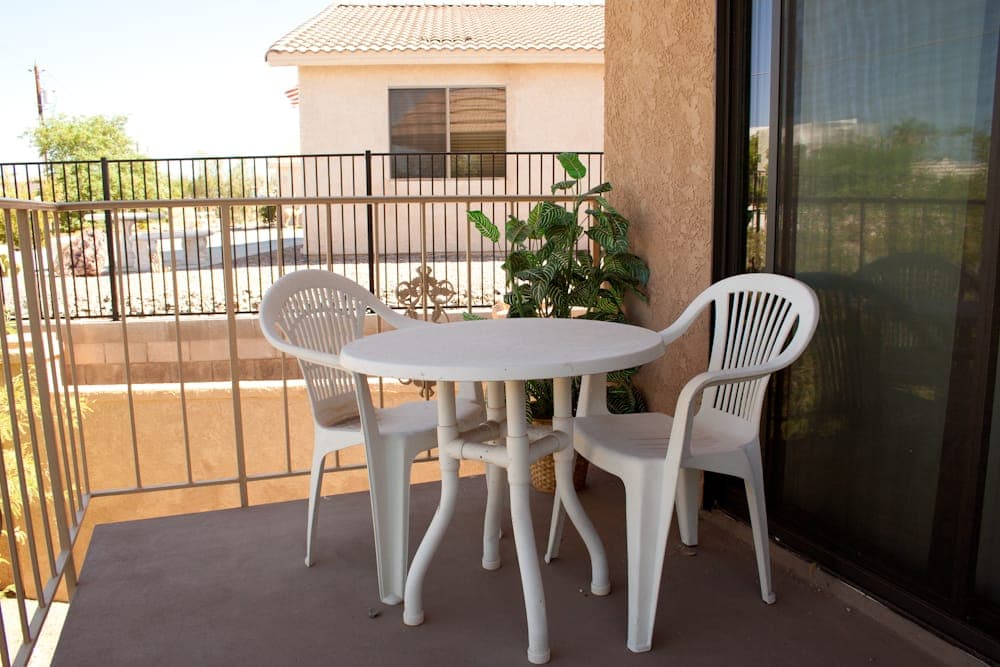Private balcony with patio seating overlooking the desert